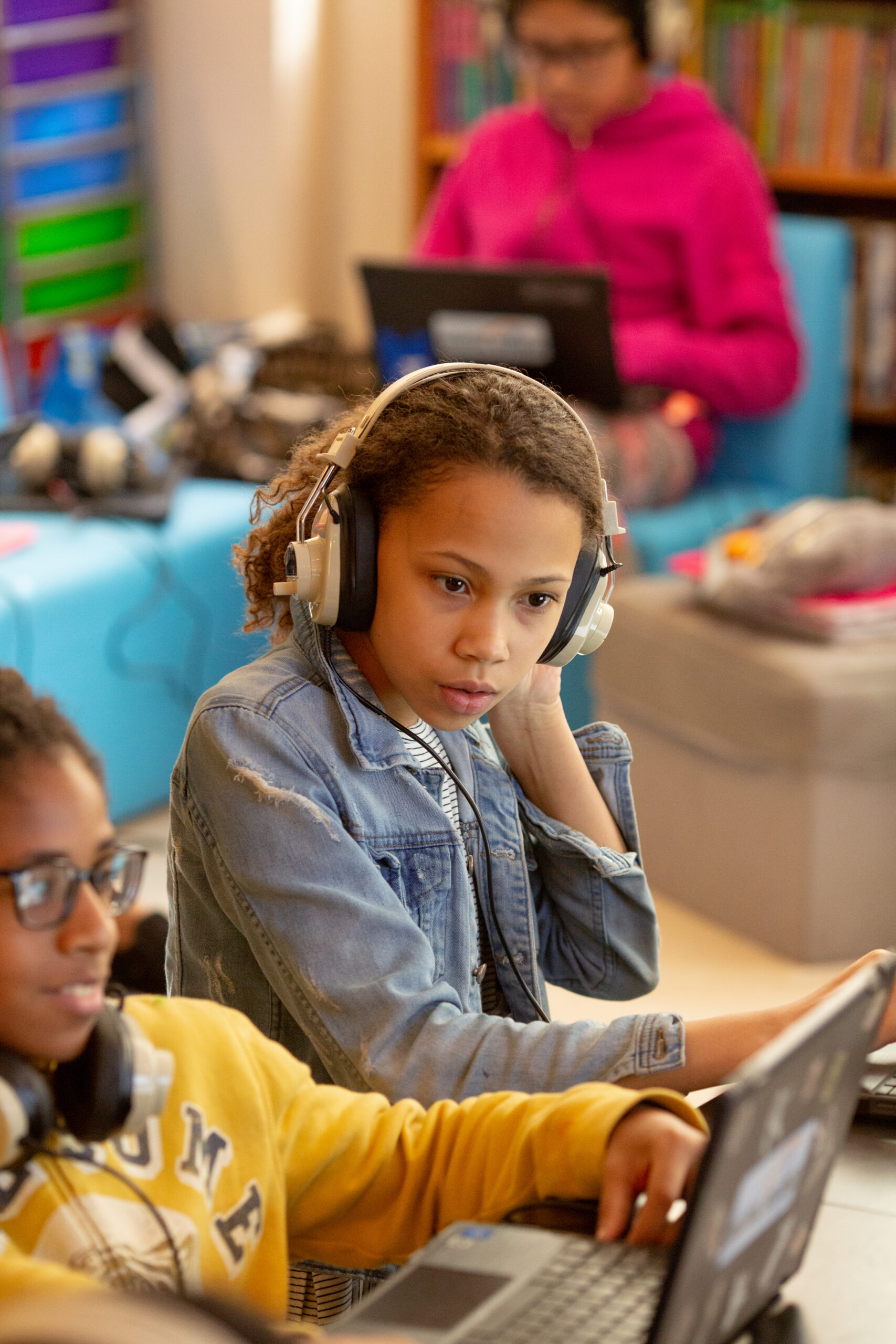 A sixth-grade student listens to music and writes about the feelings the song evokes for her during a lesson in English class.